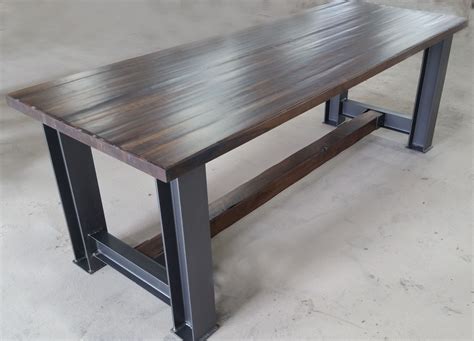 Bookmatch maple slab dining table with. Raphael table- Walnut table top and trestle with solid ...