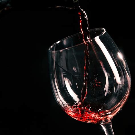 Close Up Wine Pouring Into Glass Photo Free Download