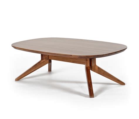 It's obviously a bit longer than a round coffee table, so it gives you as much surface area as possible. Cross oval coffee table | Architonic