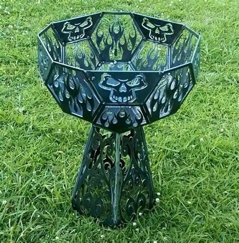 Skull fist head f the pack official video 2011. Skull fire pit | Home | Pinterest | Fire pits, Fire and Skulls