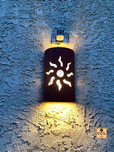 Dry, damp or wet location listed: Dancing Sun Outdoor Ceramic Wall Sconce, Exterior ...
