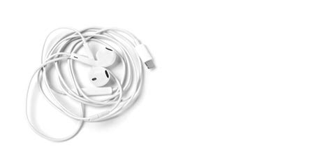 Premium Photo White Headphones With Headset Lie On White I