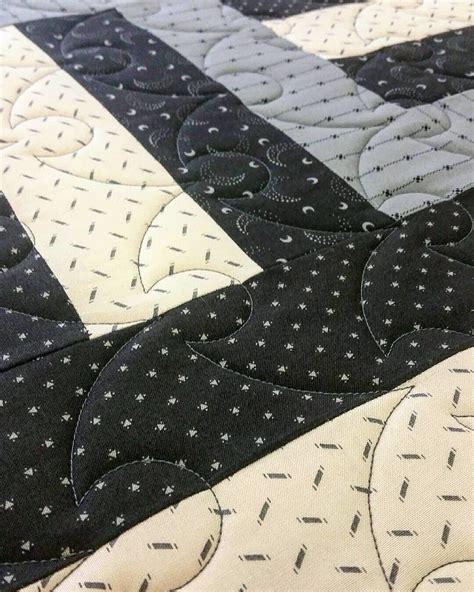 A Beautiful Quilt Made With The Lakeside Gathering Fabric Collection