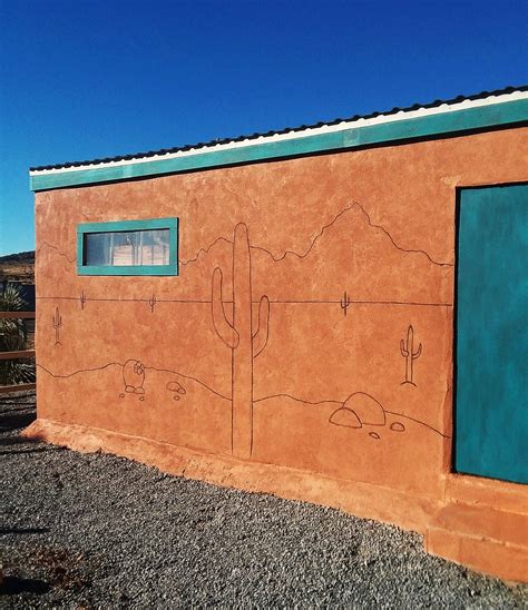 Beginnings Of Southwest Desert Scene Mural On Stucco Train Car By
