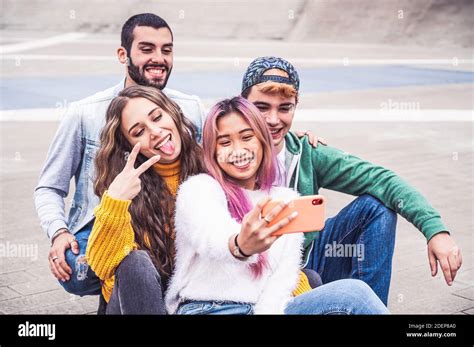 Happy Multiracial Teenage Friends Smile While Taking A Selfie In The City Street New Normal
