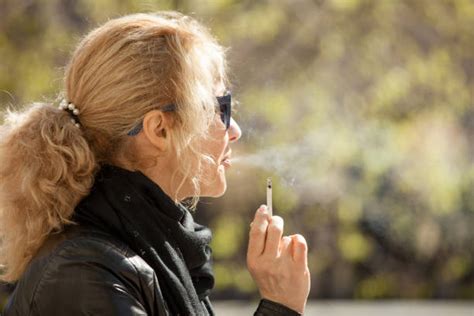 Older Woman Smoking Stock Photos Pictures And Royalty Free Images Istock