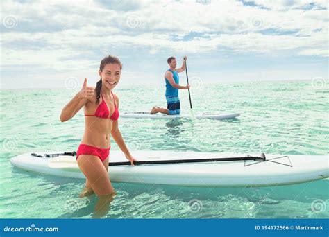 Paddleboard Beach People On Stand Up Paddle Boards Surfing In Ocean On