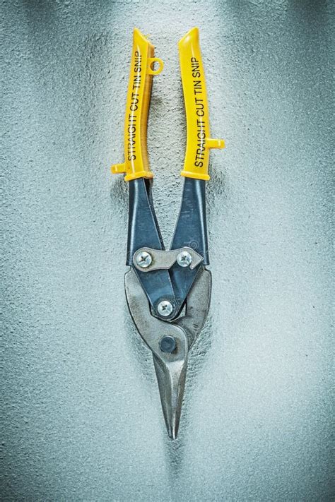 Straight Cut Tin Snips On Concrete Surface Construction Concept Stock