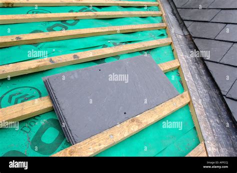 The Section Of A Slate Roof Under Construction Showing The Breathable