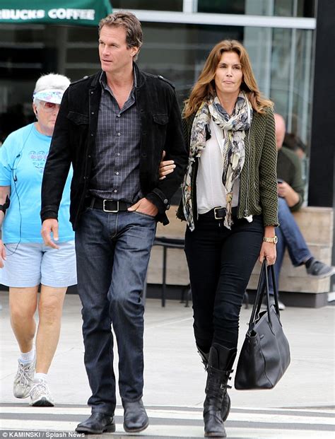 Cindy Crawford Arrives For A Flight Looking Less Than Her Usual