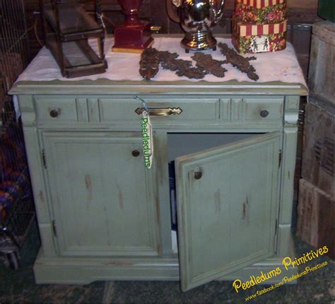 Save money by turning a popular (but inexpensive) 1980s piece of furniture into a personal kitchen for your budding little chefs. Repurposed console tv cabinet turned kitchen cabinet ...