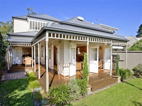 The eastern verandah has been extended out to the east to form part of a large living room. Home Remodeling Trends: Bullnose Verandah