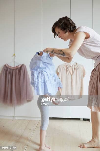 Girl Getting Dressed Stock Fotos Und Bilder Getty Images