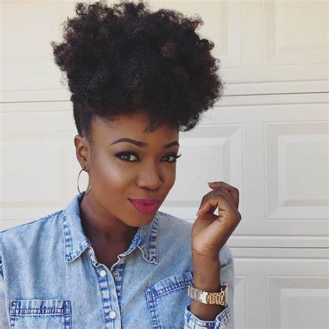 natural hair afro puffy high bun afro shows off your curl length and pairs nicely with smokey