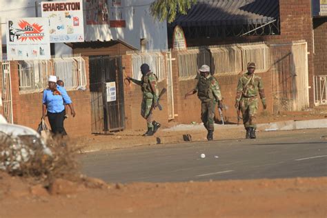 zimbabwe inquiry says army police responsible for killing 6