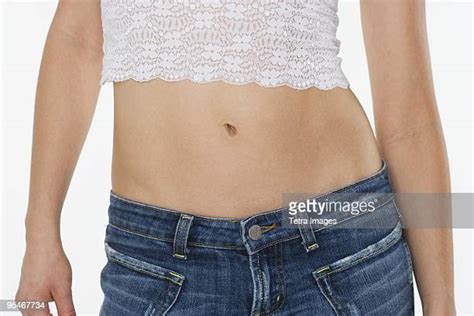 Midriff Jeans Photos And Premium High Res Pictures Getty Images