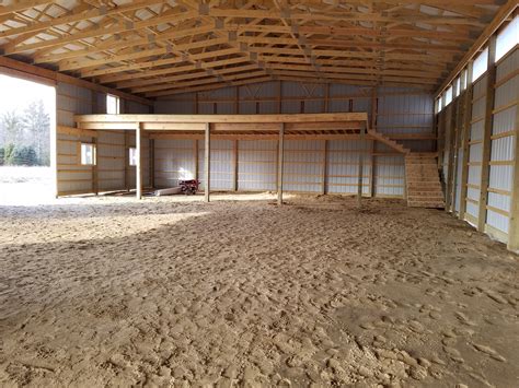 The timbers are buried directly into the ground. Livestock Barn With A Loft - Modern House