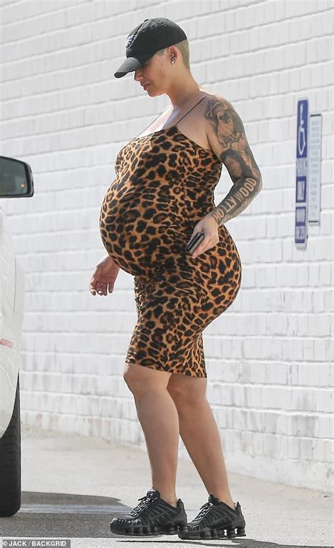 Amber Rose Jokes Shes Still Pregnant As She Flaunts Burgeoning Belly Daily Mail Online