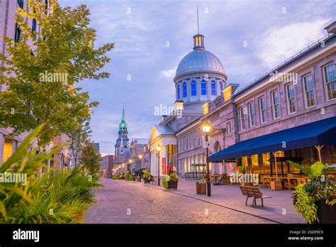 Old Town Montreal At Famous Cobbled Streets At Twilight In Canada Stock