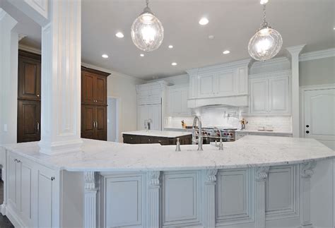 Love the marble and the glass tiles but strongly dislike the ceiling cannister lights. Honed Carrera Marble Countertops - Transitional - Kitchen ...