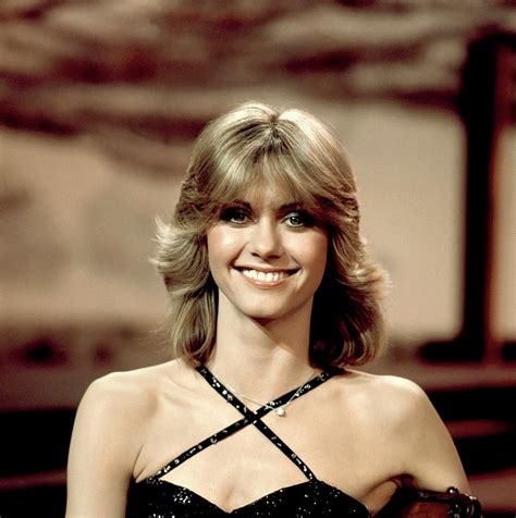 With that determination comes a drive to bring relief to those in her homeland of australia who suffer the same physical pain of cancer that she has lived through. Photo Of Olivia Newton-john by David Redfern