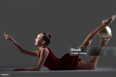 Gymnast Girl Doing Backbend Exercise With Ball Stock Photo Download