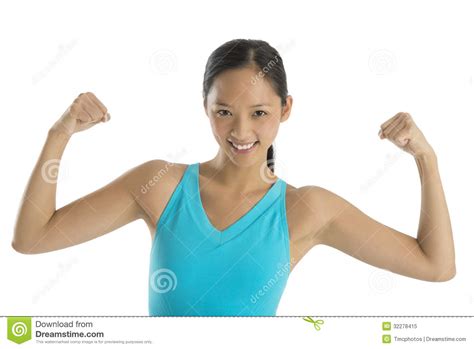 Portrait Of Happy Woman Flexing Her Muscles Royalty Free