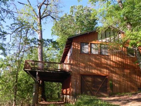 Owned by an interior designer, the cabin has a cowboy and indian theme throughout. Wilderness Lodge Cabin in Lesterville Missouri