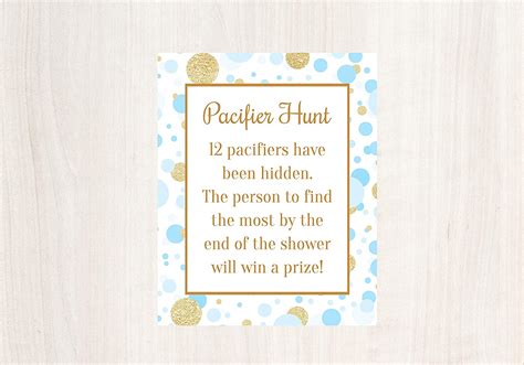 Use one stick to mark off the starting line. Amazon.com: Pacifier Hunt Game, Blue and Gold Baby Shower ...