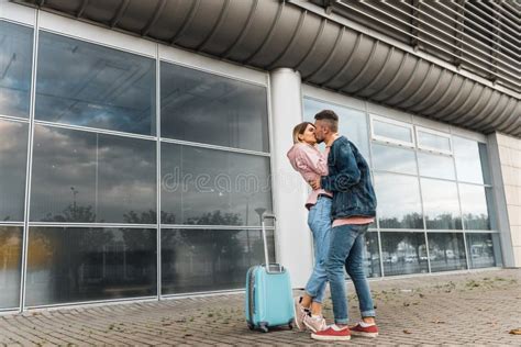 Romantic Couple Embracing Each Other At Airport Stock Image Image Of Adult Casual 173864881