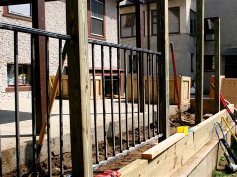 The plans include mixing concrete for the posts, assembling the frame and attaching the. How to Build a Wood and Metal Patio Fence | HGTV