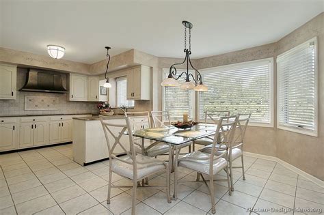 A white kitchen cabinet can offer more counter space or additional shelving for essentials like pots and pans. Pictures of Kitchens - Traditional - Off-White Antique ...