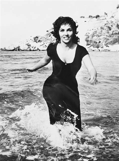 She was the daughter of a furniture manufacturer, and grew up in the pictorial mountain village. Gina Lollobrigida In The Law Movie On Photograph by Keystone-france