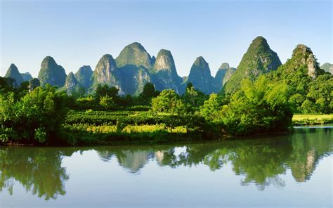 Guilin Yangshuo Landschaft China Berge Flüsse Wasserreflexion