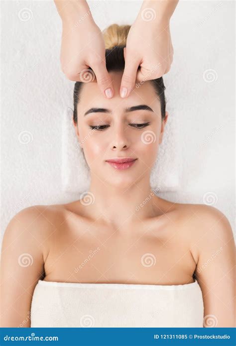 Woman Getting Professional Facial Massage At Spa Salon Stock Image