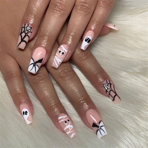 47 Cute And Spooky Halloween Nail Ideas 2022 Ghost Mummy And Spiderweb