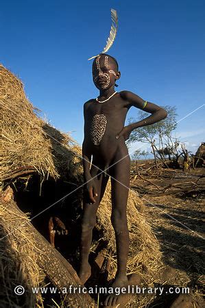 Photos And Pictures Of Mursi Boy In Village Mago National Park South Omo Ethiopia The