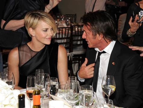 Charlize Theron Sean Penn Cozy Up At Actors Help Haiti Home Benefit