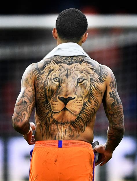 'the lion depay explains that it represents him, as he was 'brought up in the jungle'. Bovenbeen Tattoo Man YUR46 - AGBC