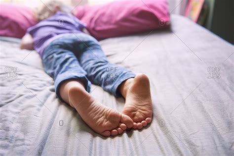 Close Up Of The Feet Of A Sleeping Girl Stock Photo Offset