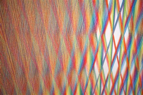 Thousands Of Threads Form Vibrant Rainbows