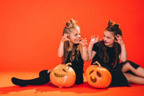 Download Group Of Girls Dressed In Halloween Costumes In