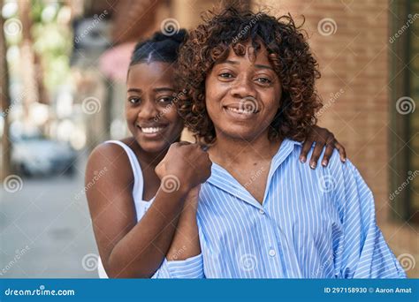 African American Women Mother And Daughter Hugging Each Other At Street Stock Photo Image Of
