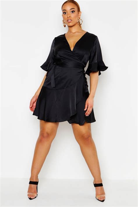 boohoo plus satin wrap ruffle skater dress in black lyst