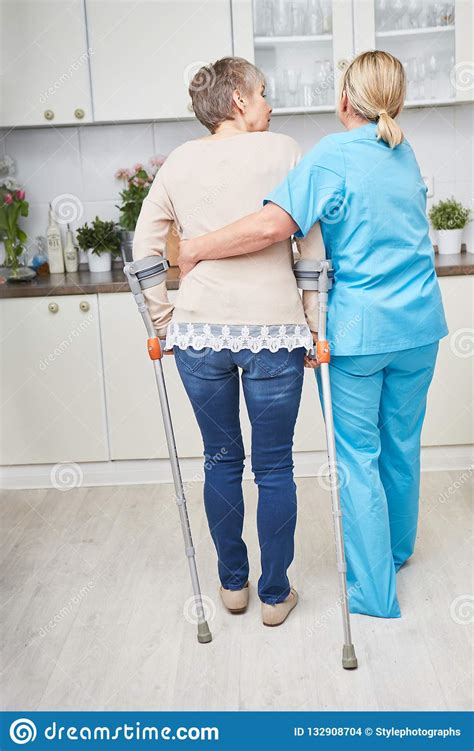 Senior Woman With Crutches Stock Photo Image Of Retirement 132908704