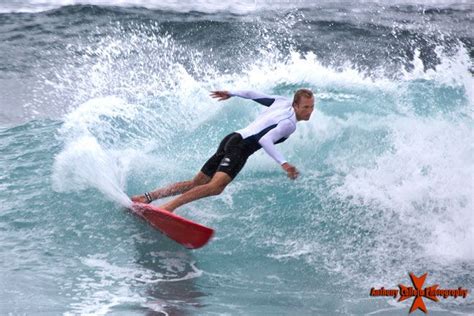 Pro Surfer Surfing At Sunset Beach North Shore Oahu