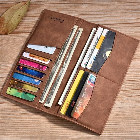 Inside there are 4 credit card slots, a flap over coin pocket, ban note section, and three useful slip pockets for extra cards, folded notes, and receipts etc. soft wallet Men Bifold Purse Wallet Men Soft Leather ...