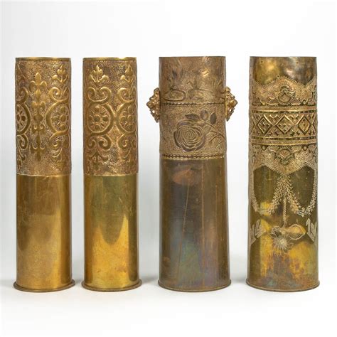 A Collection Of 4 Cannon Shells Trench Art Decorated With Copper