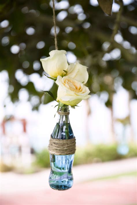 Hanging Coke Bottle With Flowers