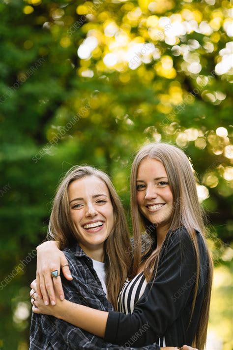 Portrait Of Two Young Female Friends Hugging In Park Stock Image F0211160 Science Photo